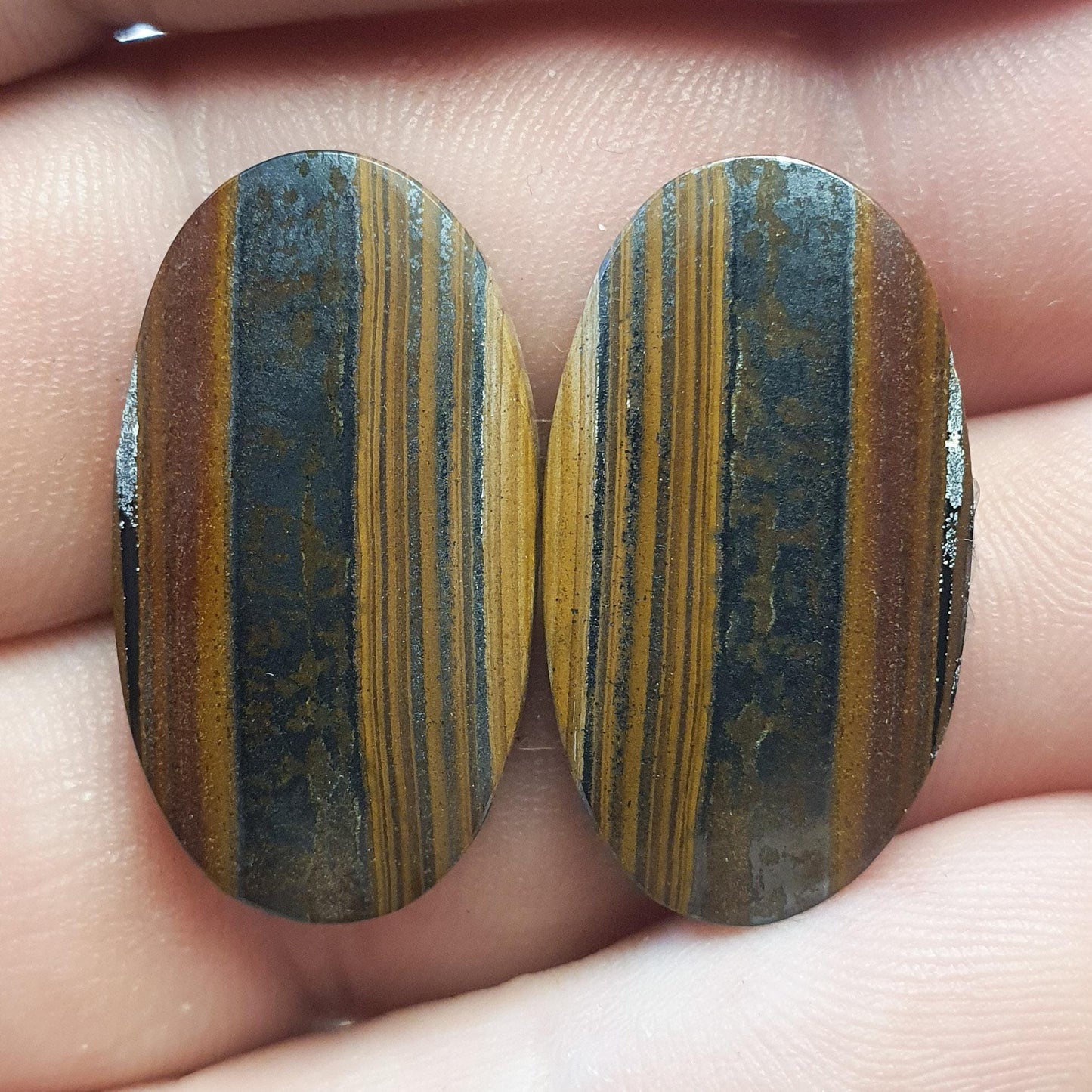 Pair of prieska iron eye cabochons