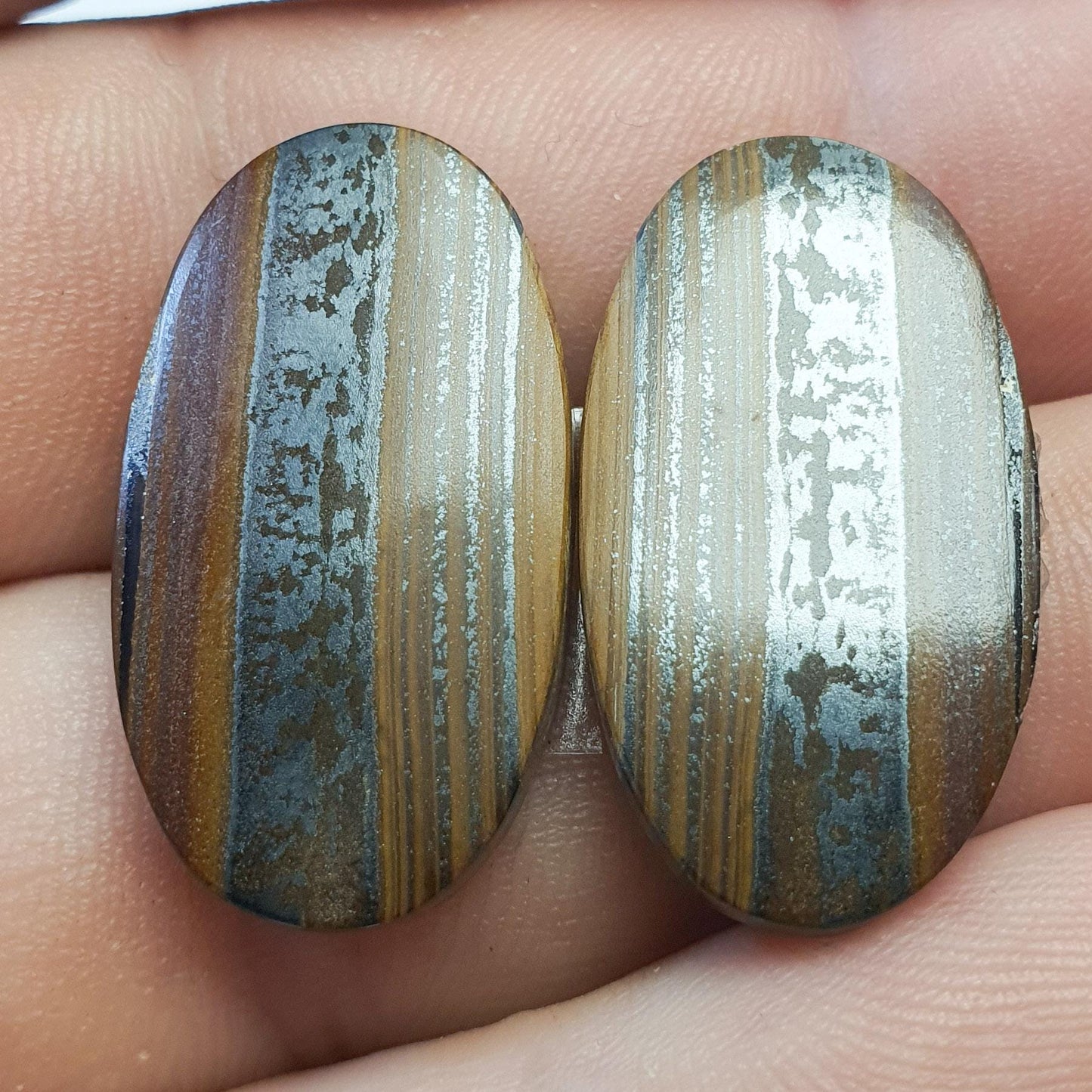 Pair of prieska iron eye cabochons