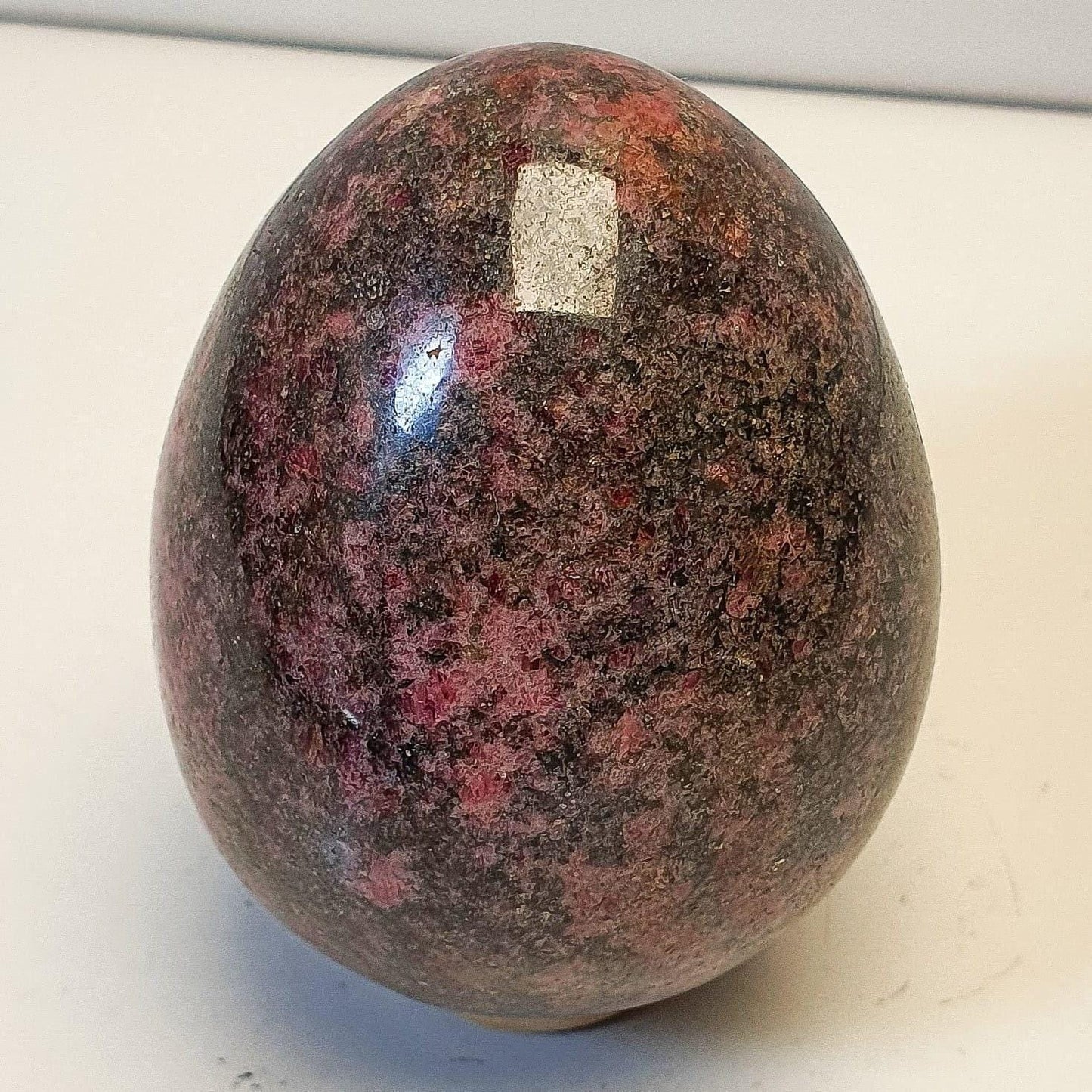 Rhodonite forme libre polie