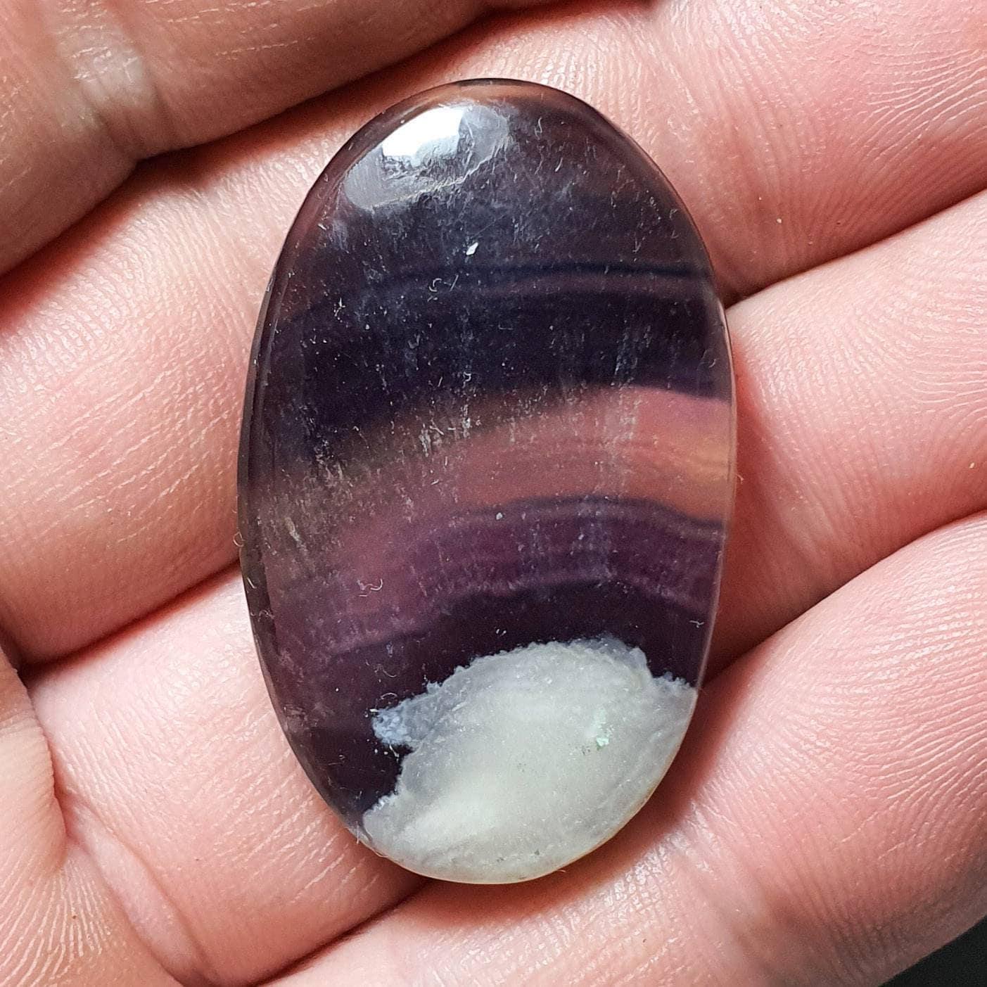 Grooved fluorite cabochon